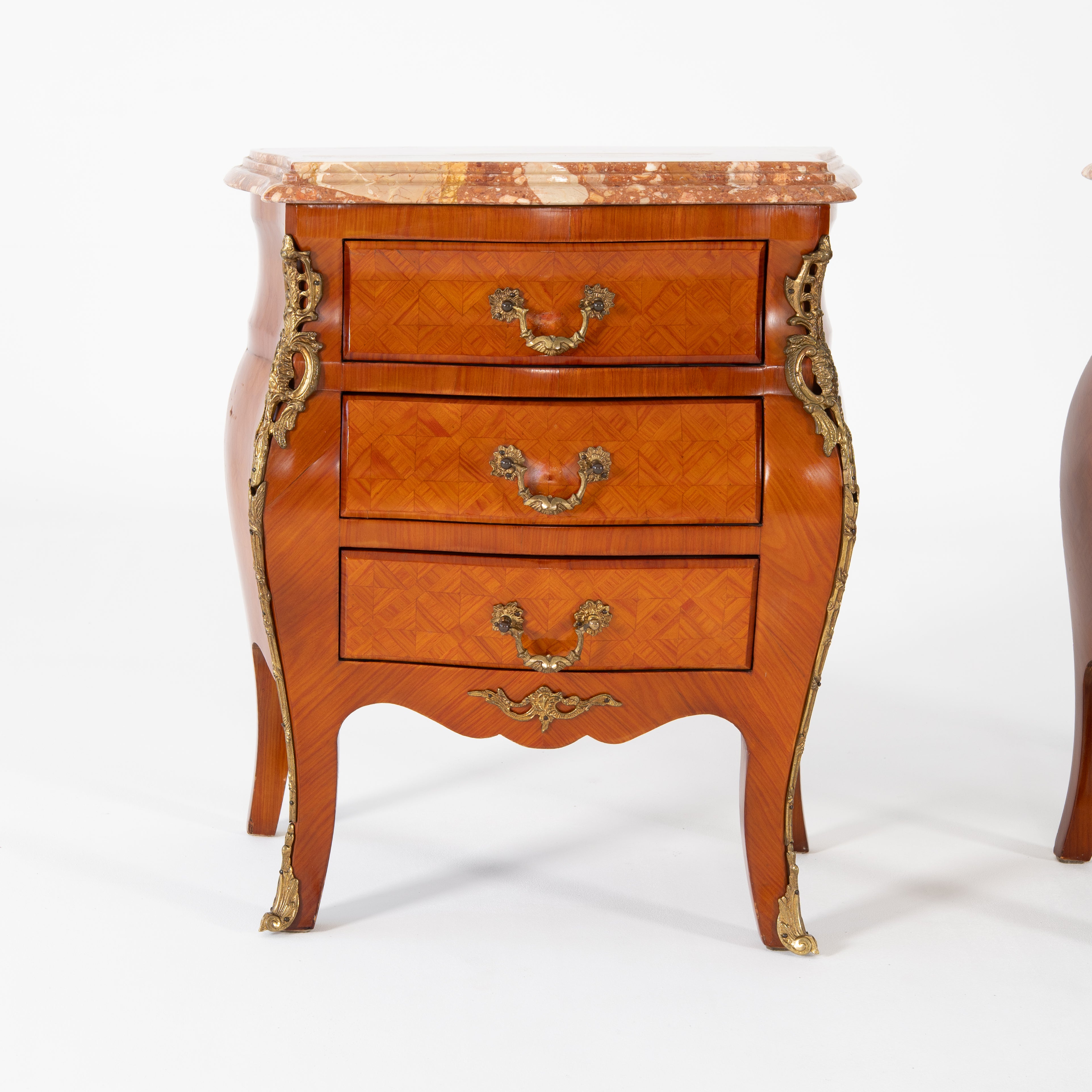 Coppia comodini in bois de roise, bronzo e marmo -xx secolo-